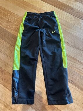 Nike Black Track Pants with Neon Green Side Panels